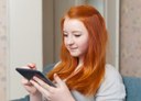 young-girl-uses-tablet-computer.jpg